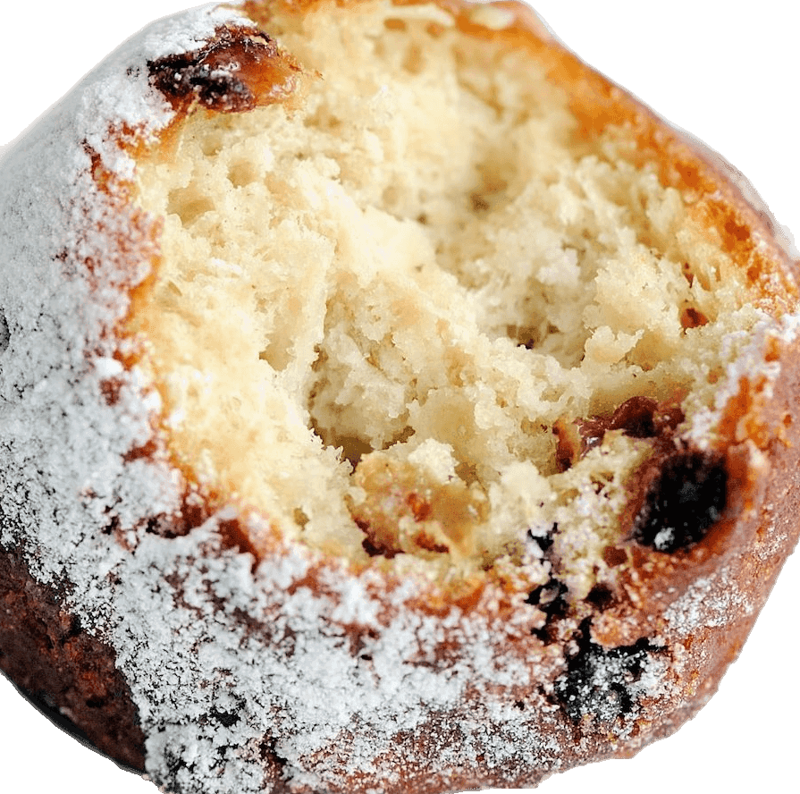 Vers gebakken oliebol met poedersuiker van Rauwerda's Oliebollen